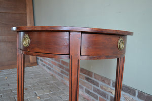 antieke haltafel, antieke halvemaan tafel, antieke mahonie tafel, antieke wandtafel, antieke plantentafel, antieke halfronde tafel op drie poten met twee laden.